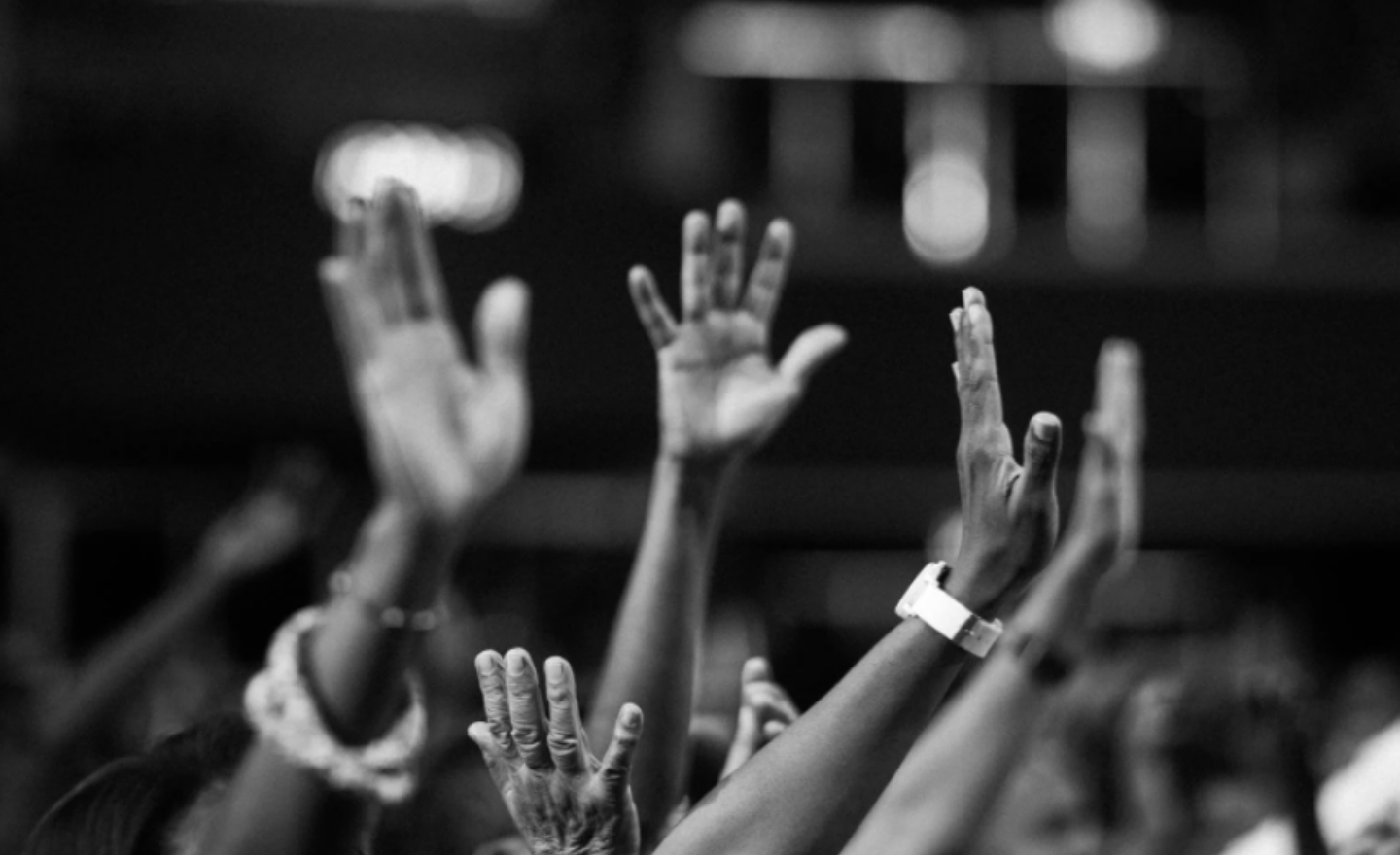 Couple of hands raised up